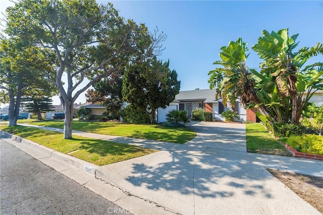 view of front of home with a front yard