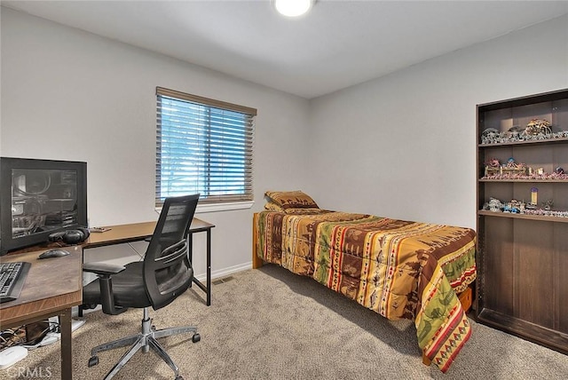 bedroom with light carpet