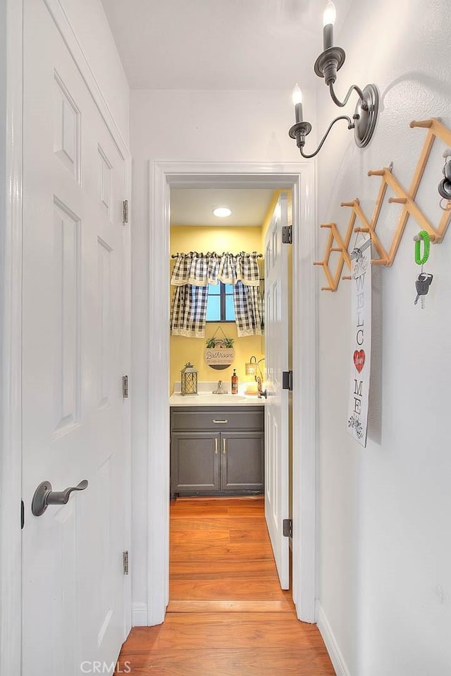 hallway with light wood-type flooring