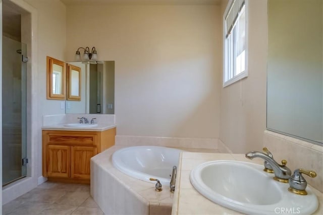 bathroom featuring vanity, tile patterned flooring, and shower with separate bathtub