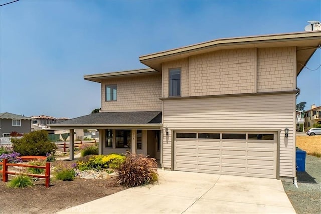 view of front of property featuring a garage