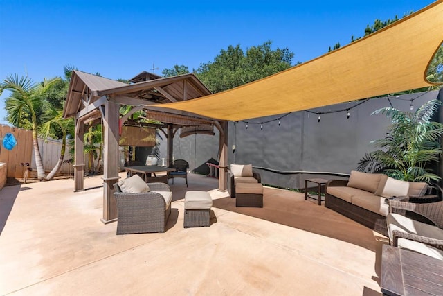 view of patio featuring a gazebo and an outdoor hangout area