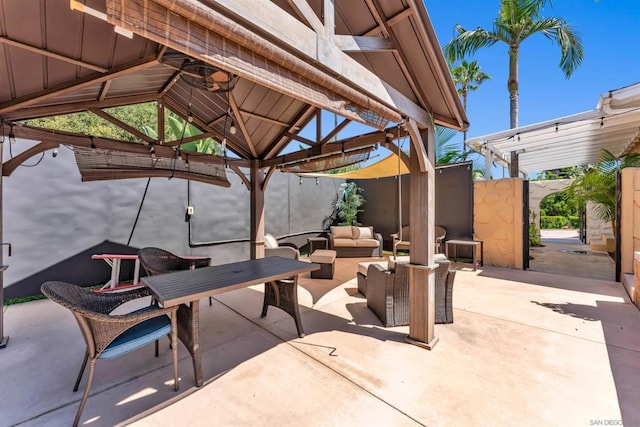 view of patio / terrace featuring a gazebo and an outdoor living space