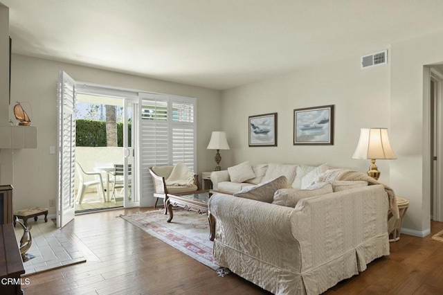 living room with hardwood / wood-style flooring