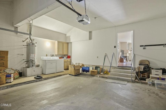 garage with independent washer and dryer, a garage door opener, and water heater