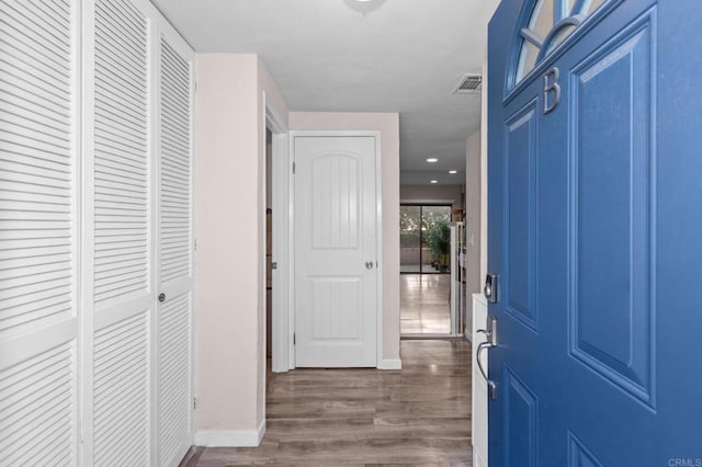 foyer entrance with dark hardwood / wood-style flooring