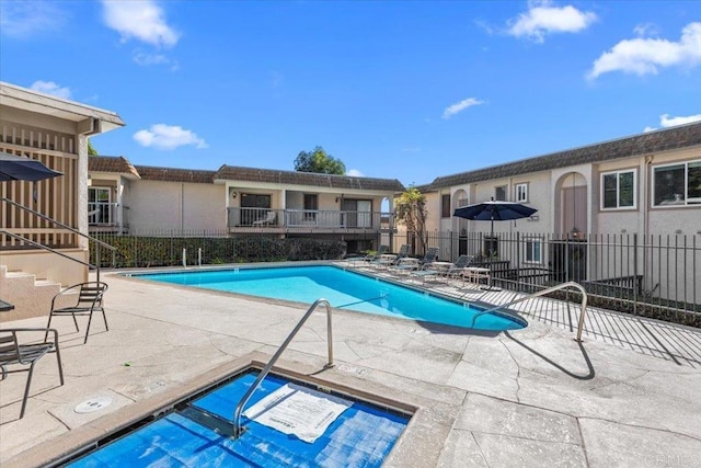 view of pool featuring a patio