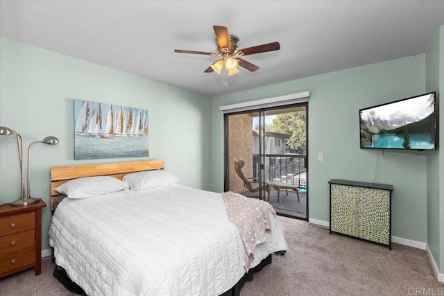 bedroom featuring access to outside, light colored carpet, and ceiling fan