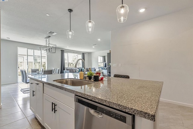 kitchen with sink, a kitchen island with sink, hanging light fixtures, white cabinets, and stainless steel dishwasher