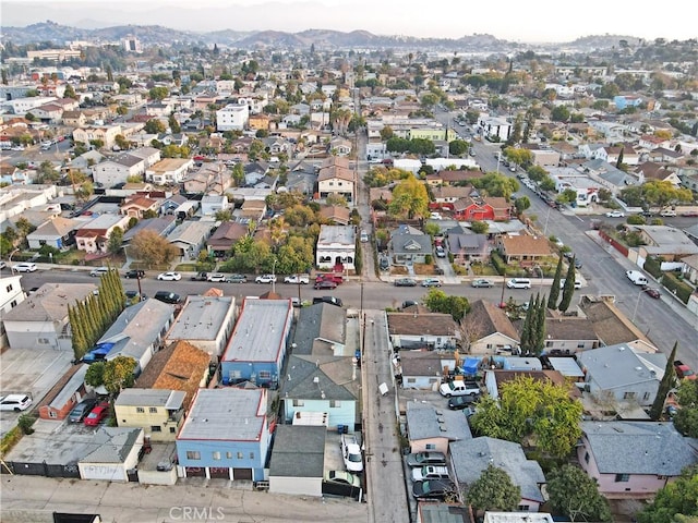 birds eye view of property featuring a mountain view