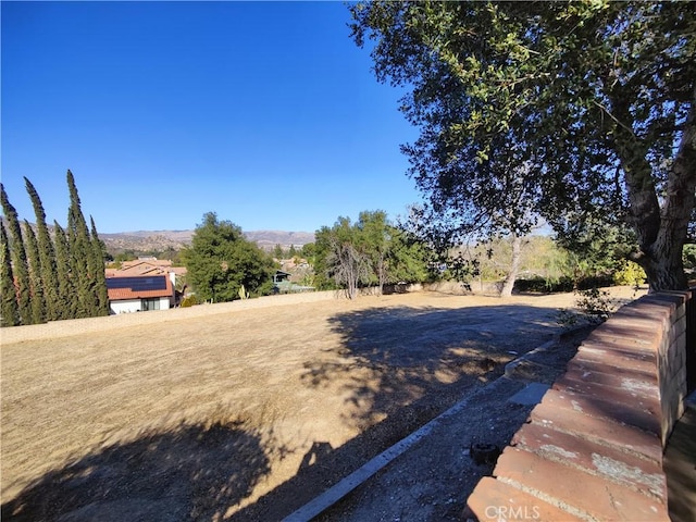 view of yard with a mountain view