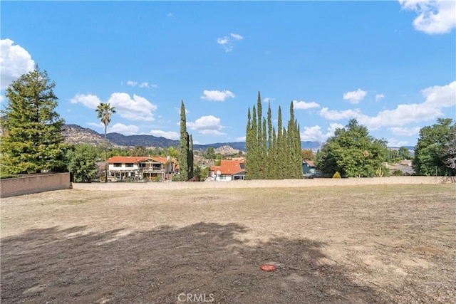 view of yard with a mountain view