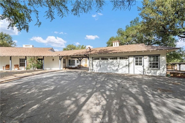 single story home with a garage