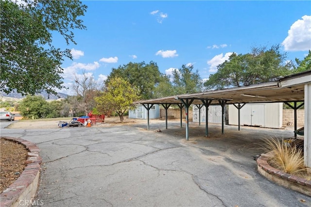 view of car parking with a carport