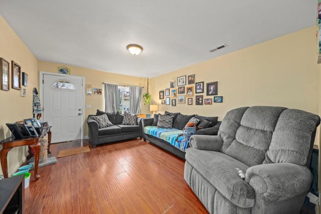 living room with wood-type flooring