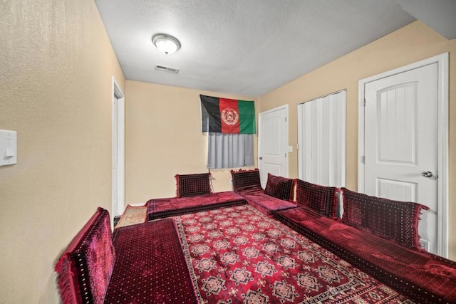 bedroom with a textured ceiling