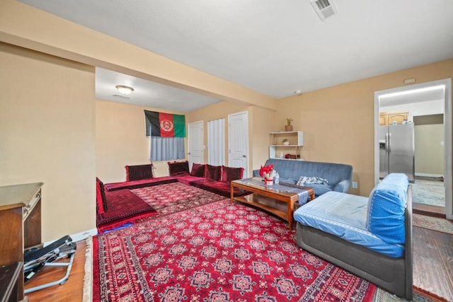 living room with wood-type flooring