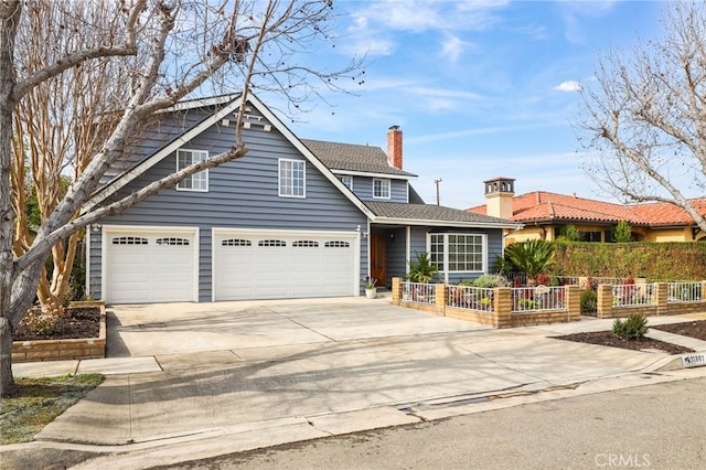 view of front of home with a garage