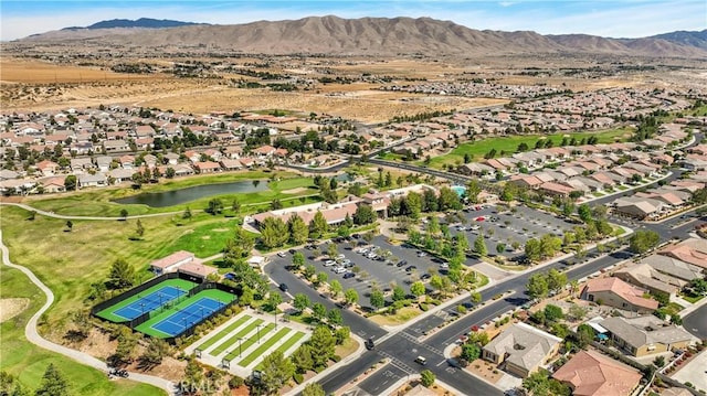 bird's eye view with a water and mountain view