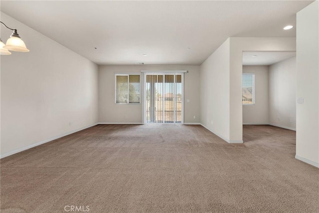 view of carpeted spare room