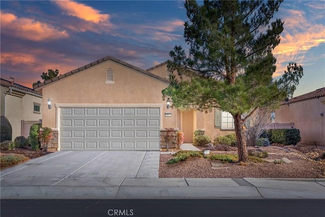 view of front of property featuring a garage