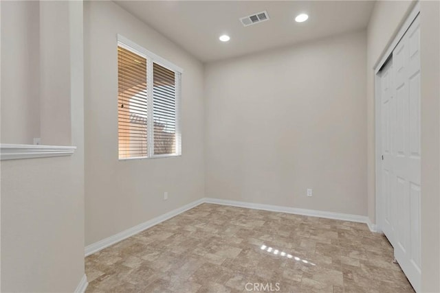 unfurnished bedroom with a closet