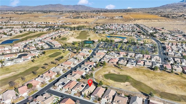 drone / aerial view featuring a mountain view