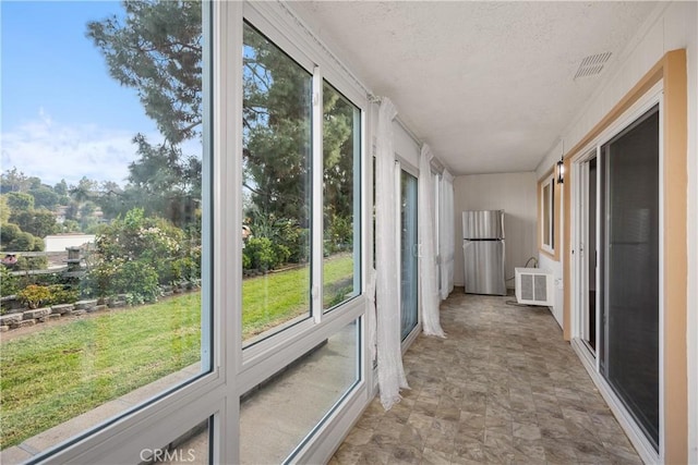 view of unfurnished sunroom