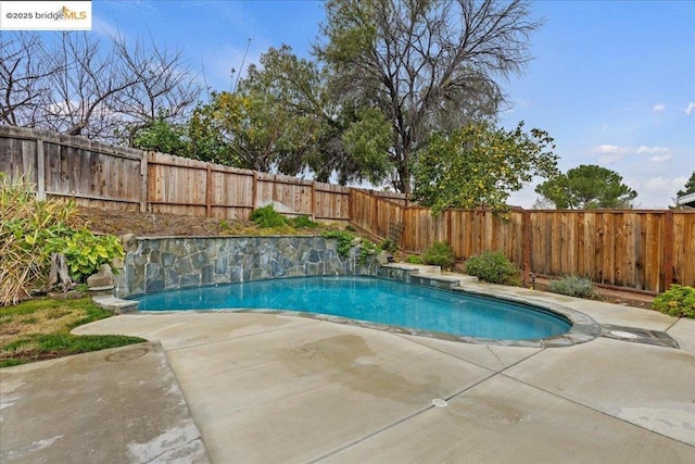 view of pool with a patio