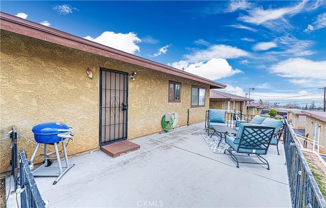 view of patio with a grill