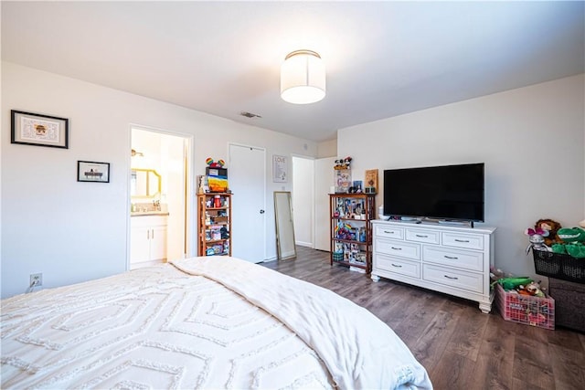 bedroom featuring dark wood-type flooring