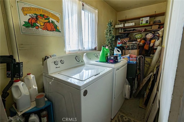 laundry room featuring washing machine and dryer