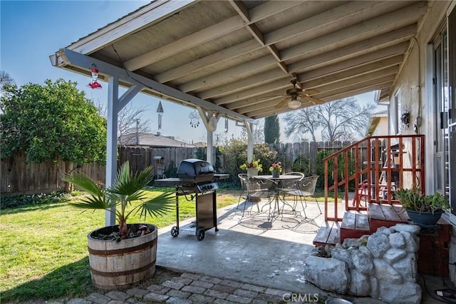 view of patio / terrace with area for grilling and ceiling fan