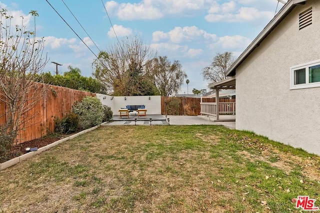 view of yard featuring a patio and an outdoor hangout area