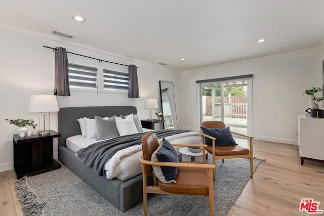 bedroom featuring access to exterior, light hardwood / wood-style flooring, and ornamental molding