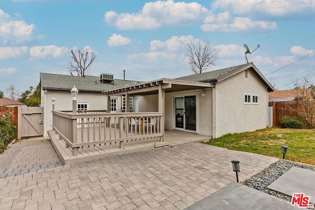 back of house with a patio area