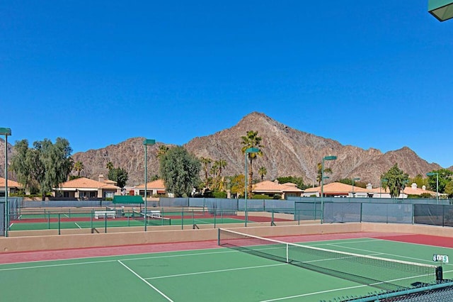 view of tennis court with a mountain view and basketball court