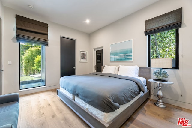 bedroom featuring light hardwood / wood-style floors