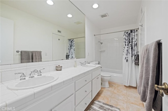 full bathroom with tile patterned flooring, vanity, shower / bathtub combination with curtain, and toilet