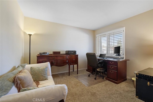 office space with light colored carpet