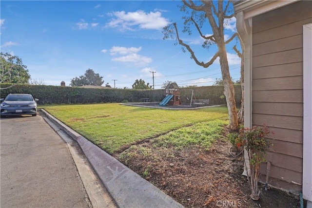 view of yard featuring a playground