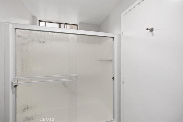 bathroom with an enclosed shower