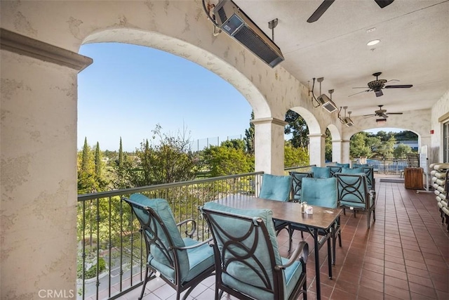 exterior space featuring ceiling fan