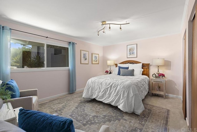 carpeted bedroom featuring crown molding