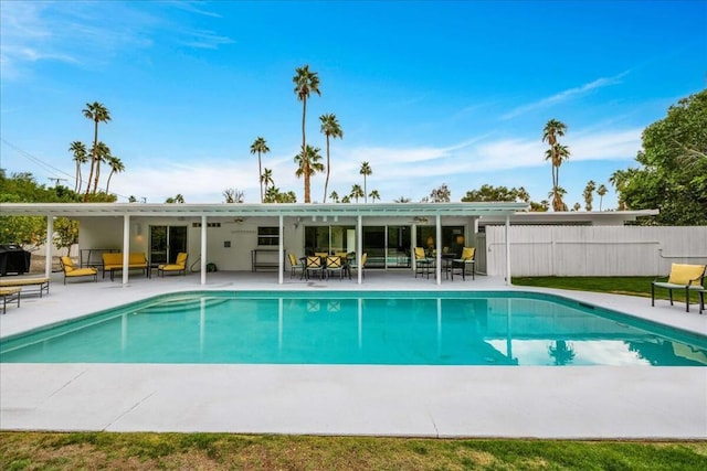 view of pool featuring a patio area