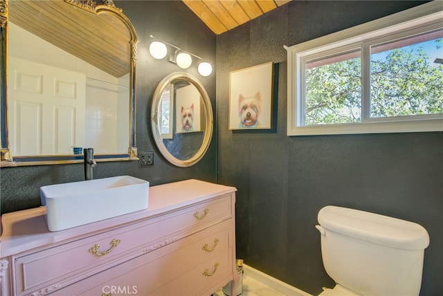 bathroom with wood ceiling, lofted ceiling, toilet, and vanity