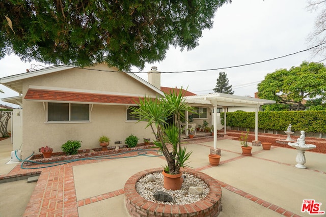 view of patio with a pergola