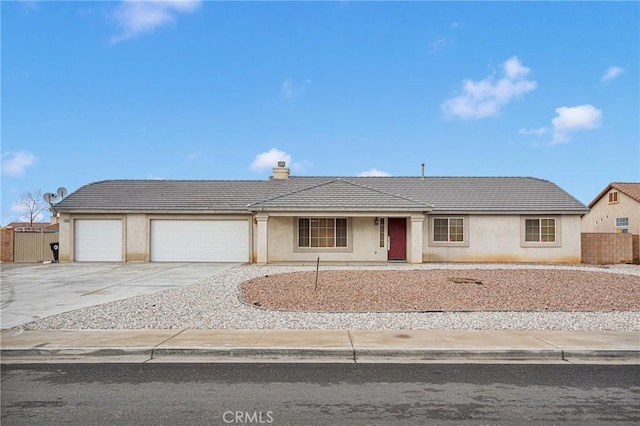 ranch-style home with a garage