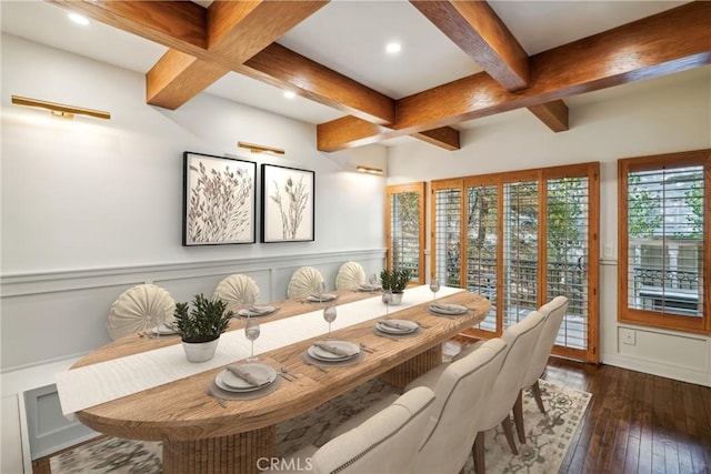 dining space with dark wood-type flooring and beam ceiling