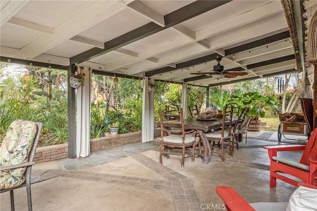 view of patio featuring ceiling fan